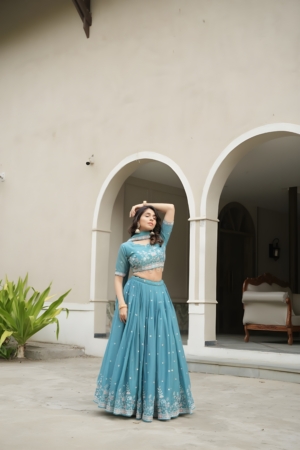 Turquoise Blue Star Georgette Embroidered Lehenga Choli For Sangeet & Wedding Wear